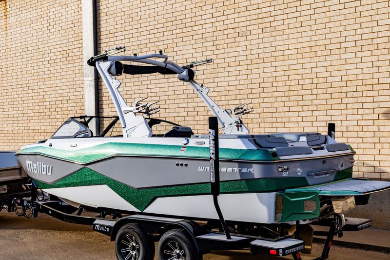 2024 MALIBU 22 LSV  in a WHITE-GREEN exterior color. Family PowerSports (877) 886-1997 familypowersports.com 