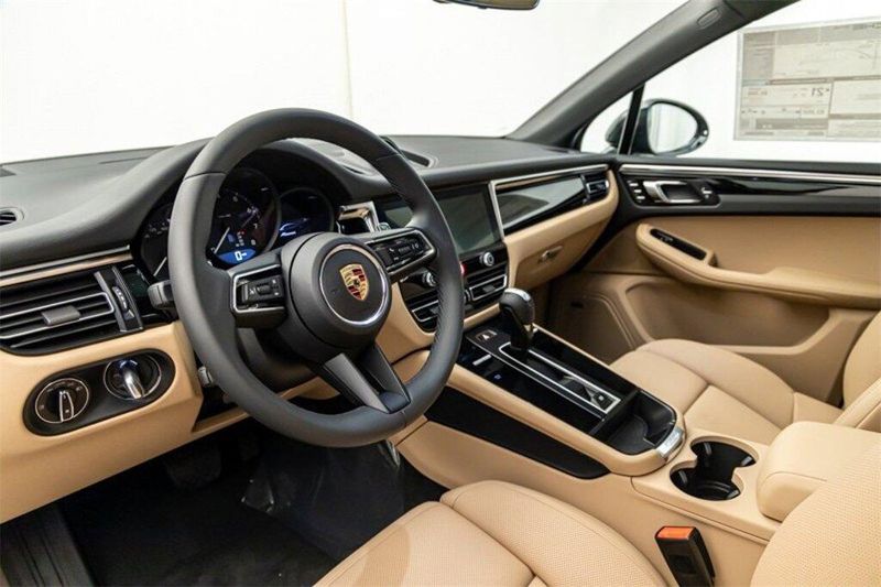 2024 Porsche Macan  in a Jet Black Metallic exterior color and Black/Mojave Beigeinterior. Lotus Manhattan 347-395-5714 lotusmanhattan.com 