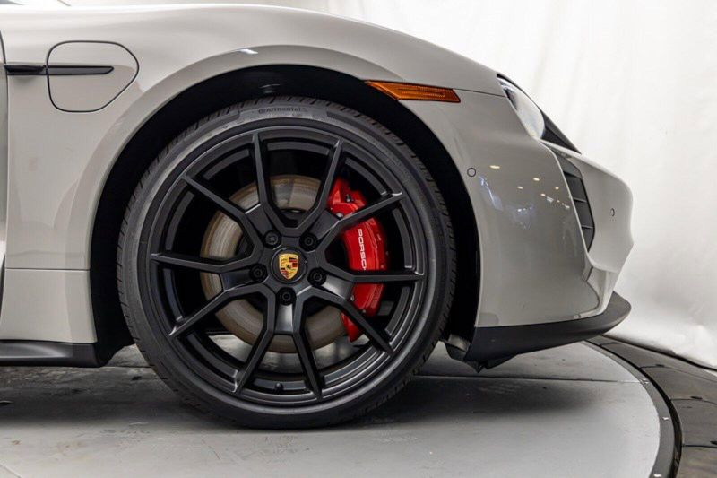 2024 Porsche Taycan GTS in a Chalk exterior color and Blackinterior. Lotus Manhattan 347-395-5714 lotusmanhattan.com 