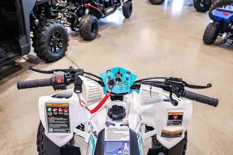 2025 Polaris OUTLAW 110 EFI BRIGHT WHITE AND RADIANT GREENImage 8