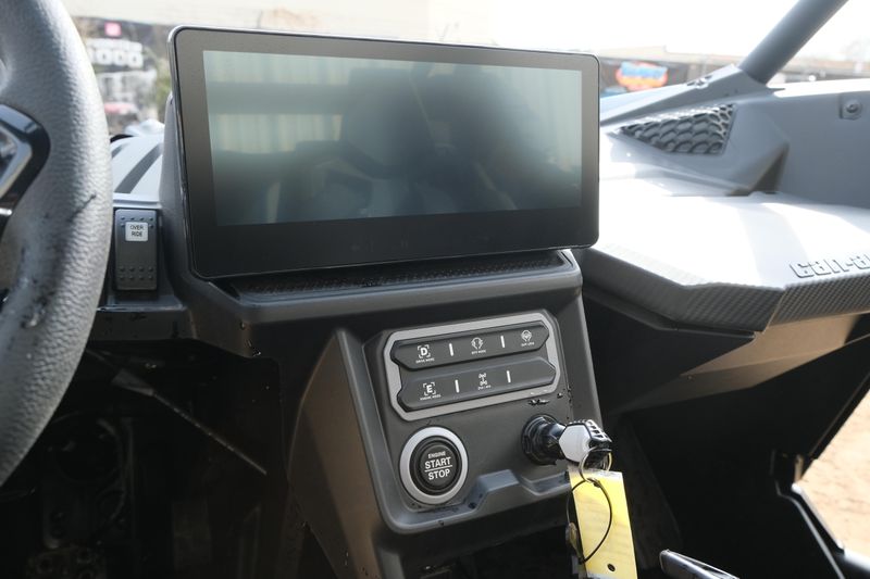 NEW 2026 CAN-AM MAVERICK X3 X RS TURBO RR WITH 1025 INCH TOUCHSCREEN  in a TRIPLE BLACK exterior color. Family PowerSports (877) 886-1997 familypowersports.com 