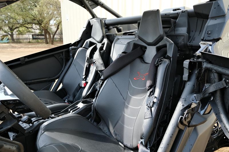 NEW 2026 CAN-AM MAVERICK X3 X RS TURBO RR WITH 1025 INCH TOUCHSCREEN  in a TRIPLE BLACK exterior color. Family PowerSports (877) 886-1997 familypowersports.com 