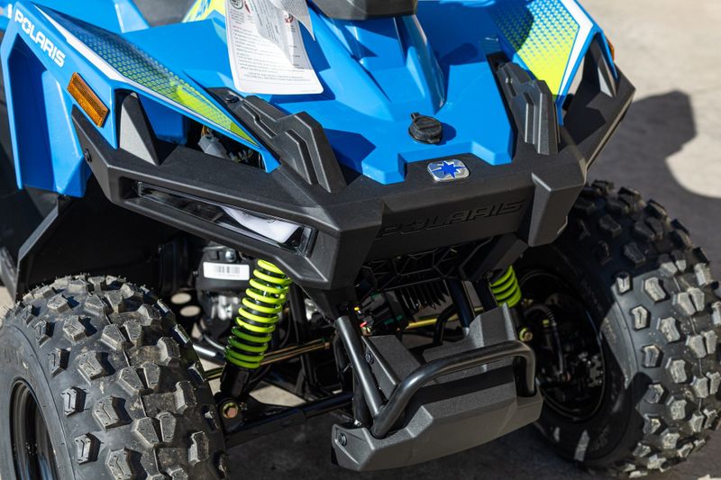 2024 POLARIS ATV24OUTLAW 70BLUELIME in a BLUE-GREEN exterior color. Family PowerSports (877) 886-1997 familypowersports.com 