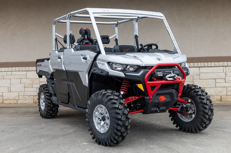 2024 CAN-AM SSV DEF MAX XMR 65 HD10 GY 24 in a SILVER-RED exterior color. Family PowerSports (877) 886-1997 familypowersports.com 