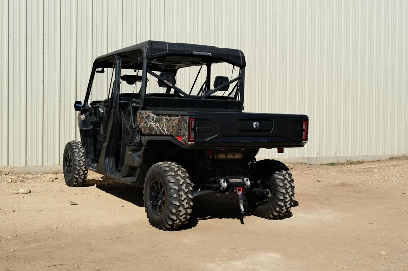 NEW 2026 CAN-AM DEFENDER MAX XT HD11 WITH 1025 INCH TOUCHSCREEN  in a DARK WILDLAND CAMO exterior color. Family PowerSports (877) 886-1997 familypowersports.com 