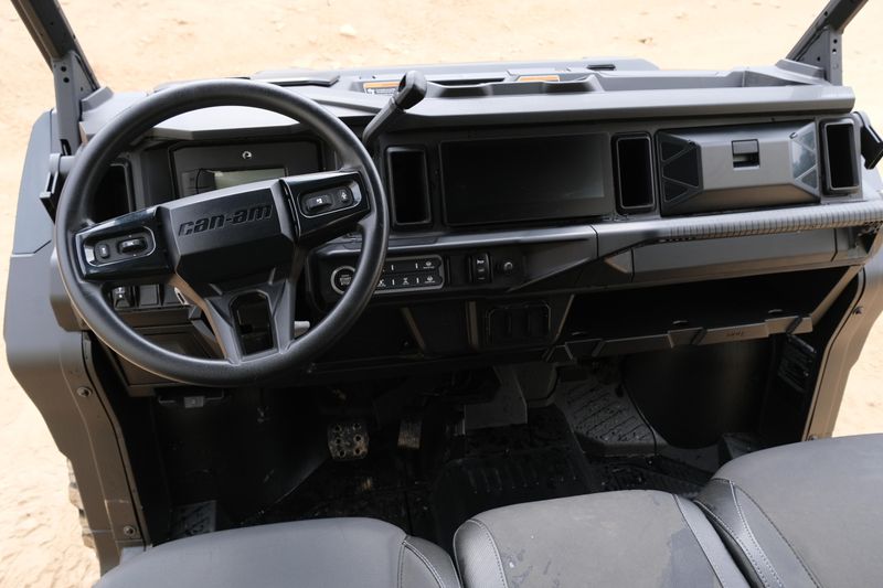 NEW 2026 CAN-AM DEFENDER MAX XT HD11 WITH 1025 INCH TOUCHSCREEN  in a STEALTH BLACK exterior color. Family PowerSports (877) 886-1997 familypowersports.com 
