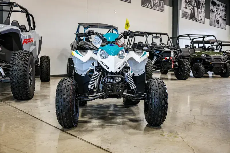 2025 Polaris OUTLAW 110 EFI BRIGHT WHITE AND RADIANT GREENImage 3