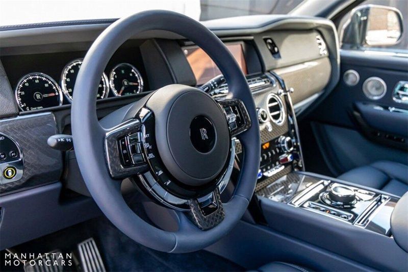 2023 Rolls-Royce Cullinan Black Badge in a Black Diamond exterior color and Navy with Scivaro Grey Accentsinterior. Lotus Manhattan 347-395-5714 lotusmanhattan.com 