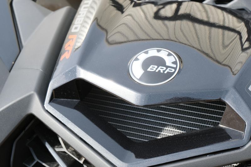 NEW 2026 CAN-AM MAVERICK X3 X RS TURBO RR WITH 1025 INCH TOUCHSCREEN  in a TRIPLE BLACK exterior color. Family PowerSports (877) 886-1997 familypowersports.com 