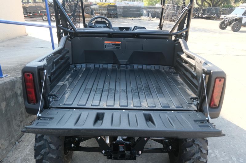 NEW 2026 HONDA PIONEER 700 DELUXE  in a HERO RED exterior color. Family PowerSports (877) 886-1997 familypowersports.com