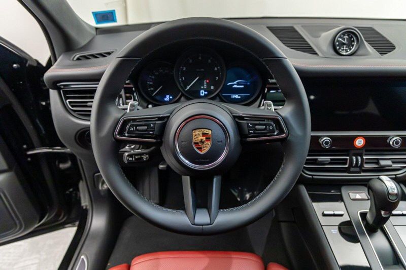 2024 Porsche Macan  in a Black exterior color and Black/Bordeaux Redinterior. Lotus Manhattan 347-395-5714 lotusmanhattan.com 