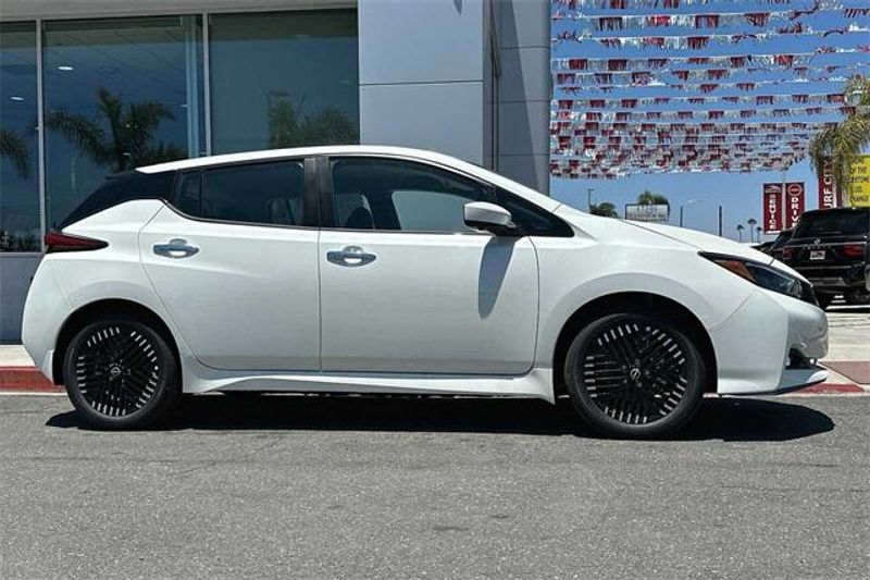 2023 Nissan Leaf SV Plus in a Pearl White Tri Coat exterior color and Blackinterior. BEACH BLVD OF CARS beachblvdofcars.com 