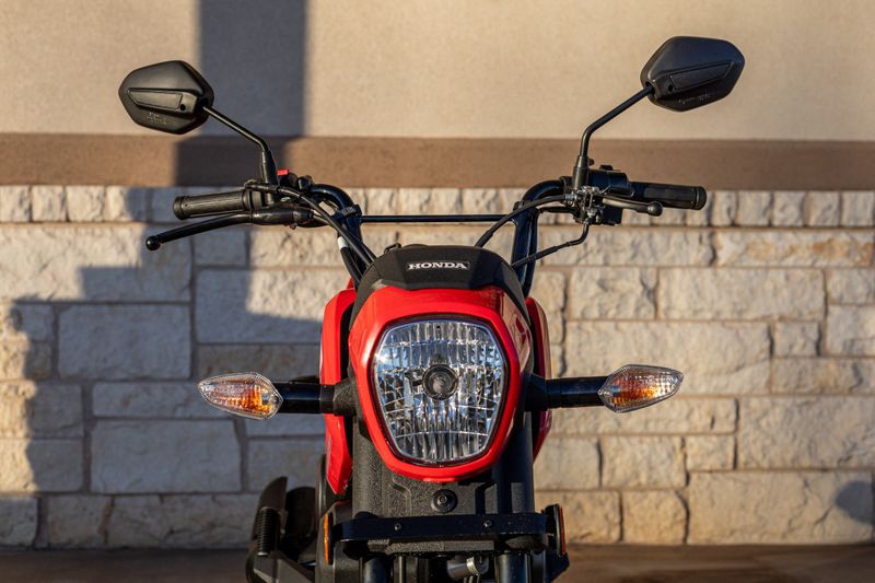 2023 HONDA Navi Base in a RED exterior color. Family PowerSports (877) 886-1997 familypowersports.com 