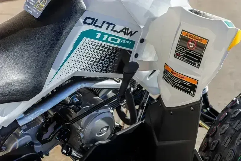 2025 Polaris OUTLAW 110 EFI BRIGHT WHITE AND RADIANT GREENImage 4