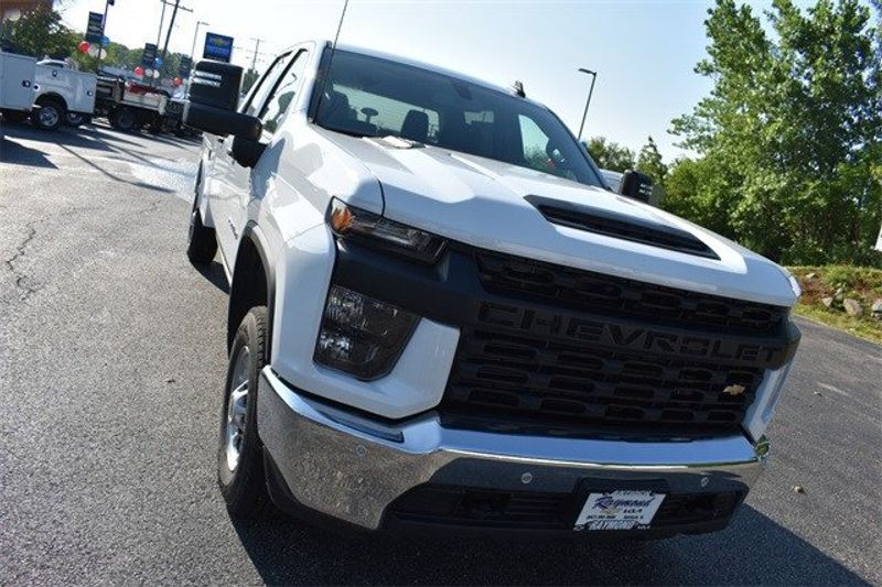 2023 Chevrolet Silverado 2500HD Work Truck in a Summit White exterior color and Blackinterior. Raymond Auto Group 888-703-9950 raymonddeals.com 