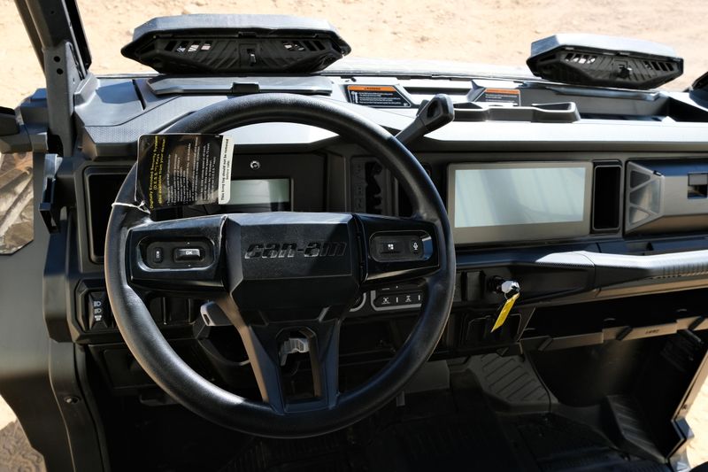 NEW 2026 CAN-AM DEFENDER MAX XT HD11 WITH 1025 INCH TOUCHSCREEN  in a DARK WILDLAND CAMO exterior color. Family PowerSports (877) 886-1997 familypowersports.com 