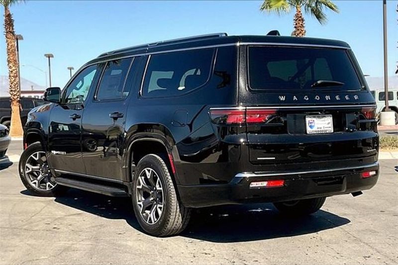 2023 Wagoneer L Series III 4X4 in a Diamond Black Crystal Pearl Coat exterior color and Global Blk Lth Trm Bkt Stinterior. I-10 Chrysler Dodge Jeep Ram (760) 565-5160 pixelmotiondemo.com 