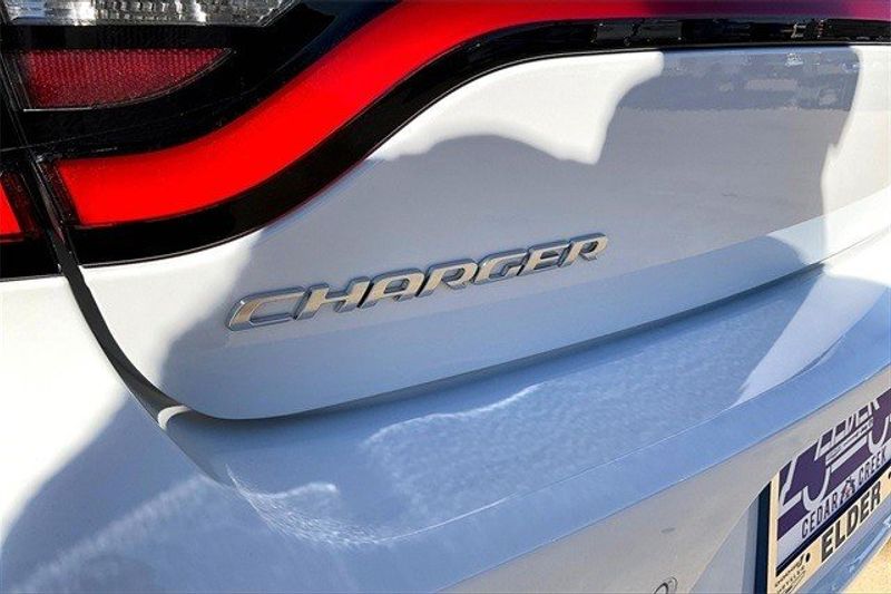 2023 Dodge Charger SXT Rwd in a White Knuckle exterior color and Blackinterior. Elder CDJR Cedar Creek 430-558-0679 eldercedarcreek.com 