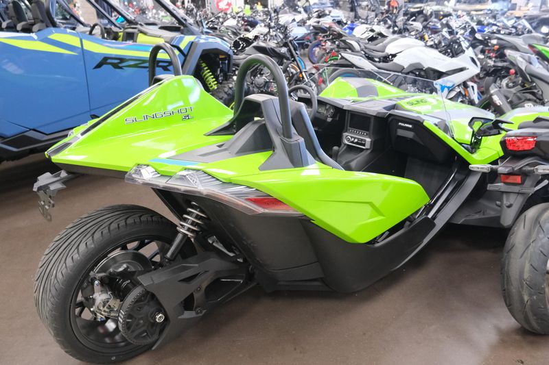NEW 2025 POLARIS SLINGSHOT SL MANUAL  in a LIQUID LIME exterior color. Family PowerSports (877) 886-1997 familypowersports.com 