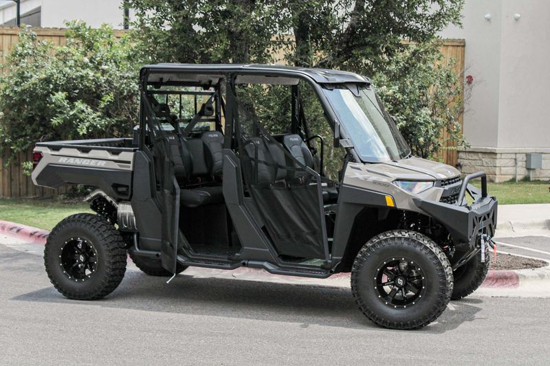 2024 POLARIS RANGER CREW XP 1000 PREM  DESERT SAND in a TAN exterior color. Family PowerSports (877) 886-1997 familypowersports.com 