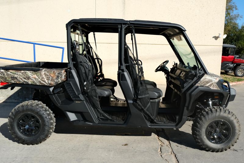 NEW 2026 CAN-AM DEFENDER MAX XT HD11  in a DARK WILDLAND CAMO exterior color. Family PowerSports (877) 886-1997 familypowersports.com 