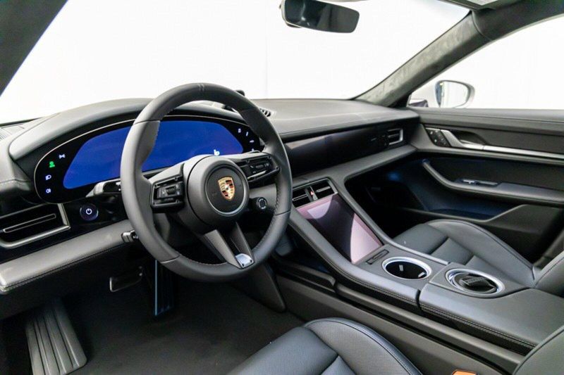 2024 Porsche Taycan GTS in a Chalk exterior color and Blackinterior. Lotus Manhattan 347-395-5714 lotusmanhattan.com 