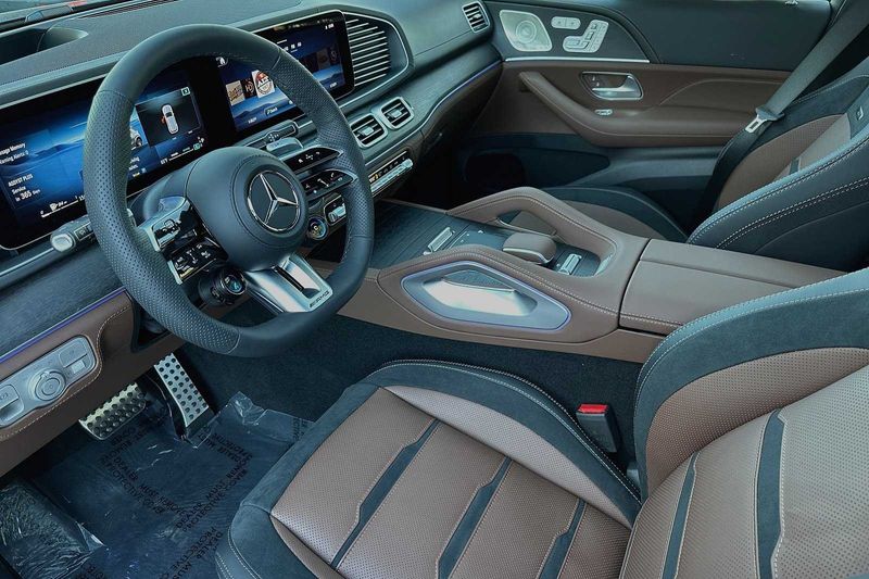 2024 Mercedes-Benz GLE-Class GLEGLE 63 S AMG in a TWILIGHT BLUE exterior color and AMG BAHIA BROWNinterior. SHELLY AUTOMOTIVE shellyautomotive.com 