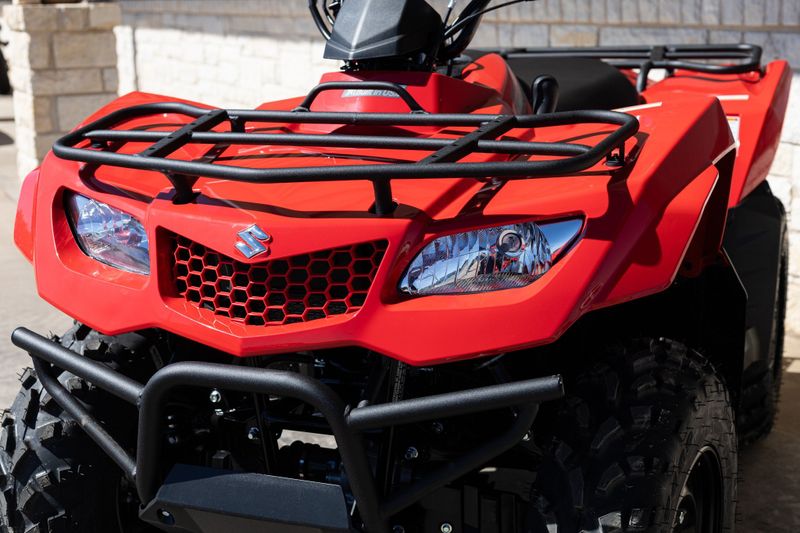 2023 SUZUKI KingQuad 400 ASi in a RED exterior color. Family PowerSports (877) 886-1997 familypowersports.com 