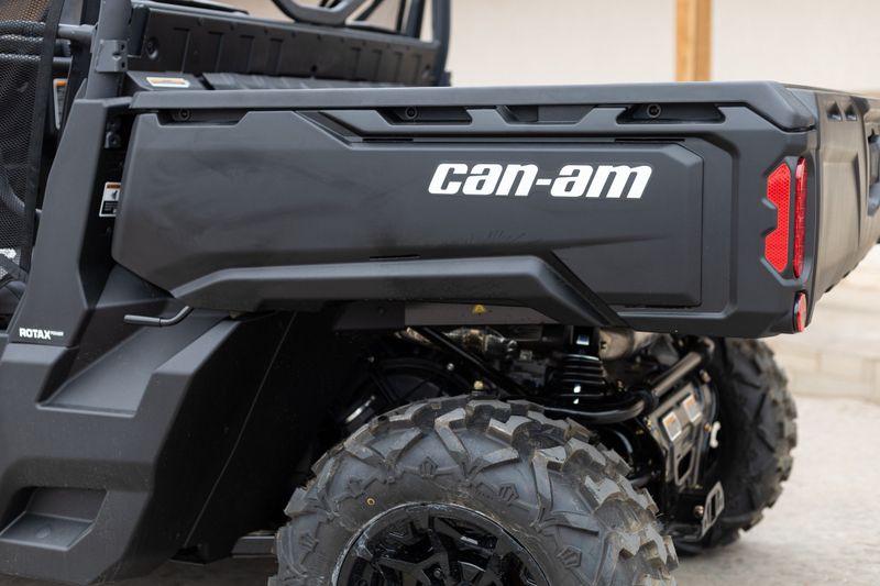 2023 CAN-AM SSV DEF MAX DPS 62 HD9 BC 23 in a CAMO exterior color. Family PowerSports (877) 886-1997 familypowersports.com 