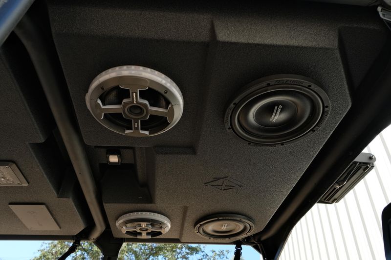 NEW 2026 CAN-AM DEFENDER MAX XT HD11 WITH 1025 INCH TOUCHSCREEN  in a DARK WILDLAND CAMO exterior color. Family PowerSports (877) 886-1997 familypowersports.com 