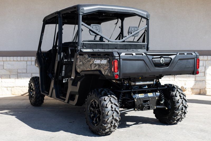 2024 CAN-AM SSV DEF MAX XT 64 HD10 CA 24 in a CAMO exterior color. Family PowerSports (877) 886-1997 familypowersports.com 