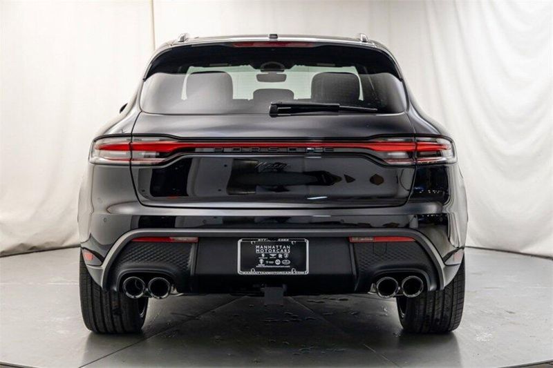 2024 Porsche Macan  in a Jet Black Metallic exterior color and Black/Mojave Beigeinterior. Lotus Manhattan 347-395-5714 lotusmanhattan.com 