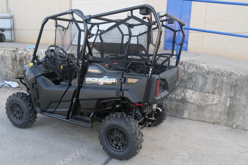 NEW 2026 HONDA PIONEER 7004 DELUXE  in a BLACK FOREST GREEN exterior color. Family PowerSports (877) 886-1997 familypowersports.com