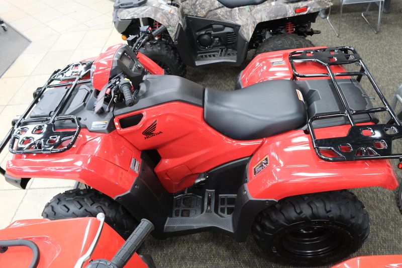 NEW 2026 HONDA FOREMAN 4X4 EPS  in a HERO RED exterior color. Family PowerSports (877) 886-1997 familypowersports.com 