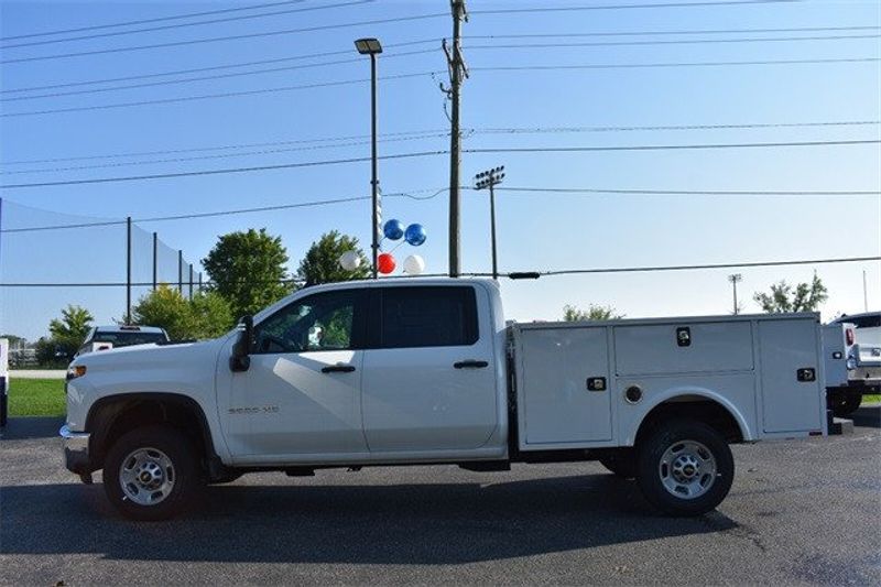 2023 Chevrolet Silverado 2500HD Work Truck in a Summit White exterior color and Blackinterior. Raymond Auto Group 888-703-9950 raymonddeals.com 