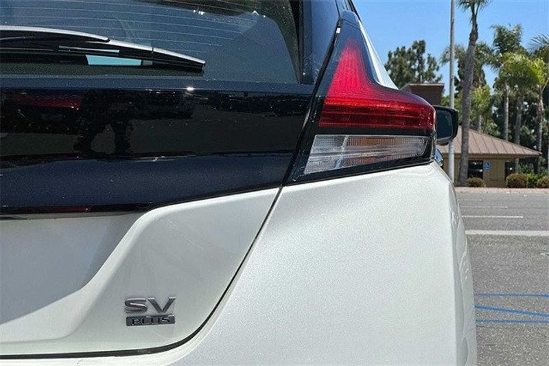 2023 Nissan Leaf SV Plus in a Pearl White Tri Coat exterior color and Blackinterior. BEACH BLVD OF CARS beachblvdofcars.com 