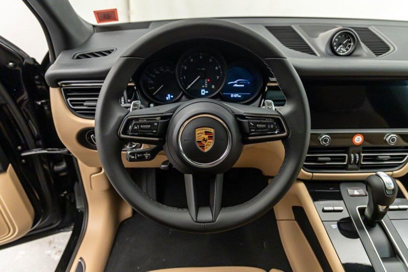 2024 Porsche Macan  in a Black exterior color and Black/Mojave Beigeinterior. Lotus Manhattan 347-395-5714 lotusmanhattan.com 