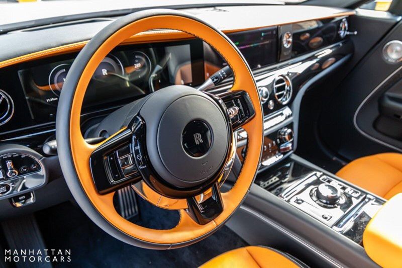 2024 Rolls-Royce Spectre  in a Tempest Grey exterior color and Black with Mandarin Accentsinterior. Lotus Manhattan 347-395-5714 lotusmanhattan.com 