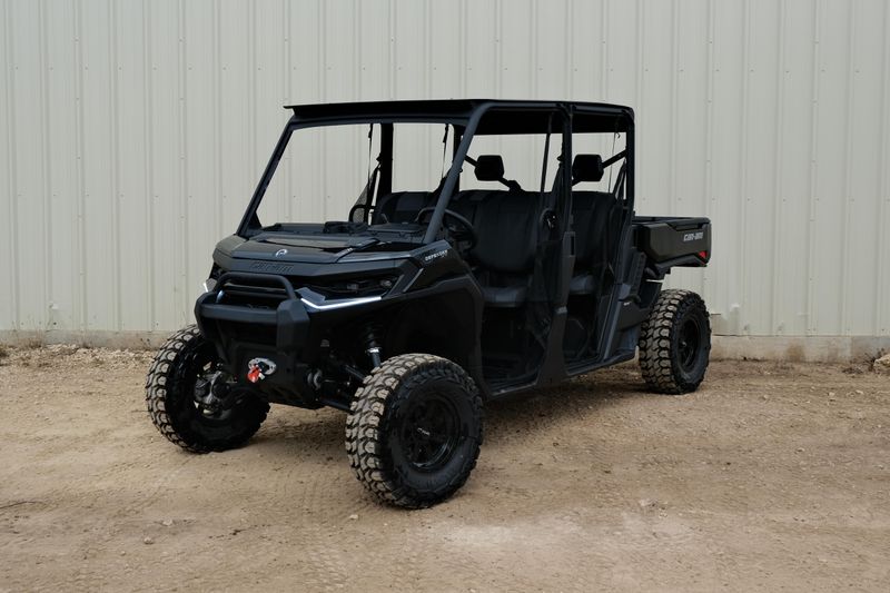 NEW 2026 CAN-AM DEFENDER MAX XT HD11 WITH 1025 INCH TOUCHSCREEN  in a STEALTH BLACK exterior color. Family PowerSports (877) 886-1997 familypowersports.com 