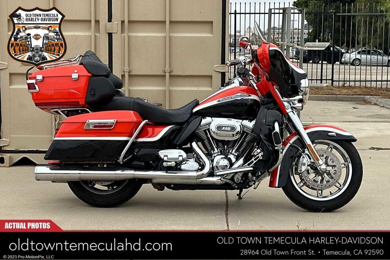 2012 Harley-Davidson Electra Glide in a ELE ORG/BLK DIA W/ PINSTRIP exterior color. BMW Motorcycles of Temecula – Southern California (951) 506-6903 bmwmotorcyclesoftemecula.com 