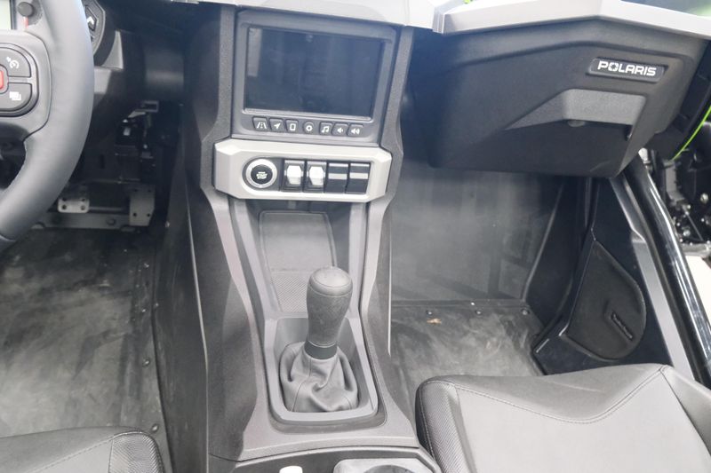 NEW 2025 POLARIS SLINGSHOT SL MANUAL  in a LIQUID LIME exterior color. Family PowerSports (877) 886-1997 familypowersports.com 