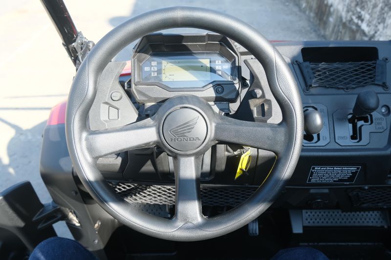 NEW 2026 HONDA PIONEER 700 DELUXE  in a HERO RED exterior color. Family PowerSports (877) 886-1997 familypowersports.com