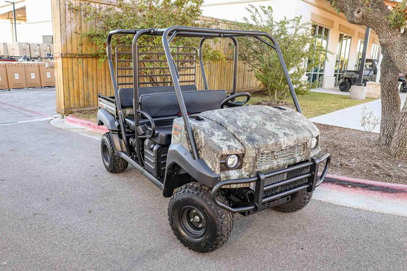 NEW 2026 KAWASAKI MULE 4010 TRANS4X4  in a TRUETIMBER STRATA exterior color. Family PowerSports (877) 886-1997 familypowersports.com 