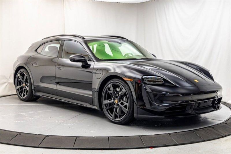 2023 Porsche Taycan Turbo S in a Jet Black Metallic exterior color and Truffle Browninterior. Lotus Manhattan 347-395-5714 lotusmanhattan.com 