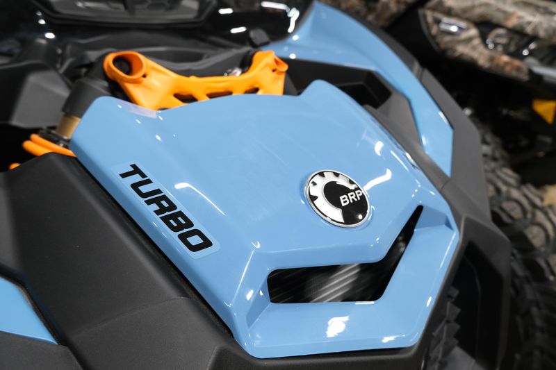 2025 CAN-AM MAVERICK X3 MAX DS TURBO SCANDI BLUE AND ORANGE CRUSH in a SCANDI BLUE AND ORANGE CRUSH exterior color. Family PowerSports (877) 886-1997 familypowersports.com 