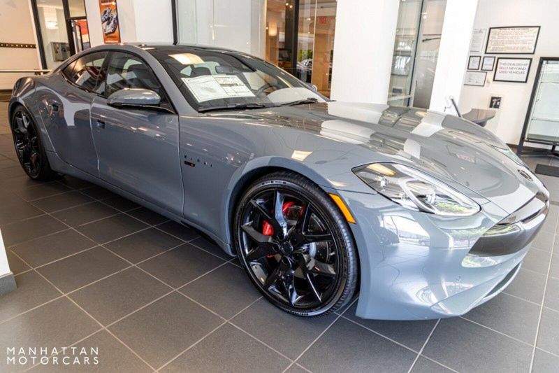 2022 Karma GS-6 Sport in a Pacifico Grey with Blackout Package exterior color and Palisades Grey over Carbon fiberinterior. Lotus Manhattan 347-395-5714 lotusmanhattan.com 