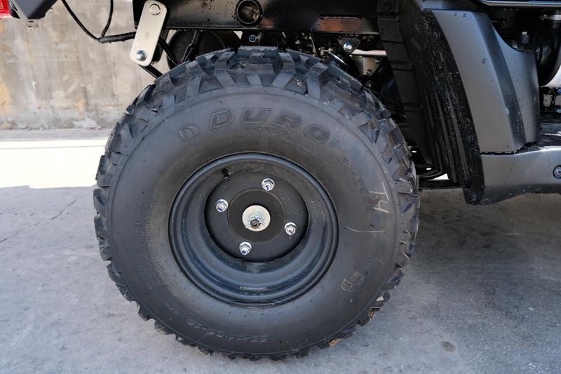 NEW 2026 KAWASAKI MULE 4010 TRANS4X4  in a DARK ROYAL RED exterior color. Family PowerSports (877) 886-1997 familypowersports.com 