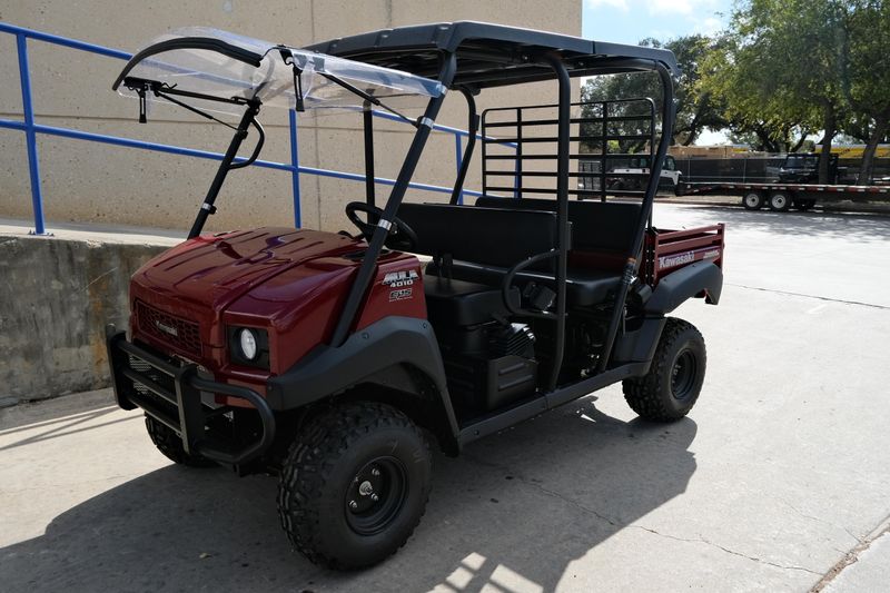 NEW 2026 KAWASAKI MULE 4010 TRANS4X4  in a DARK ROYAL RED exterior color. Family PowerSports (877) 886-1997 familypowersports.com 