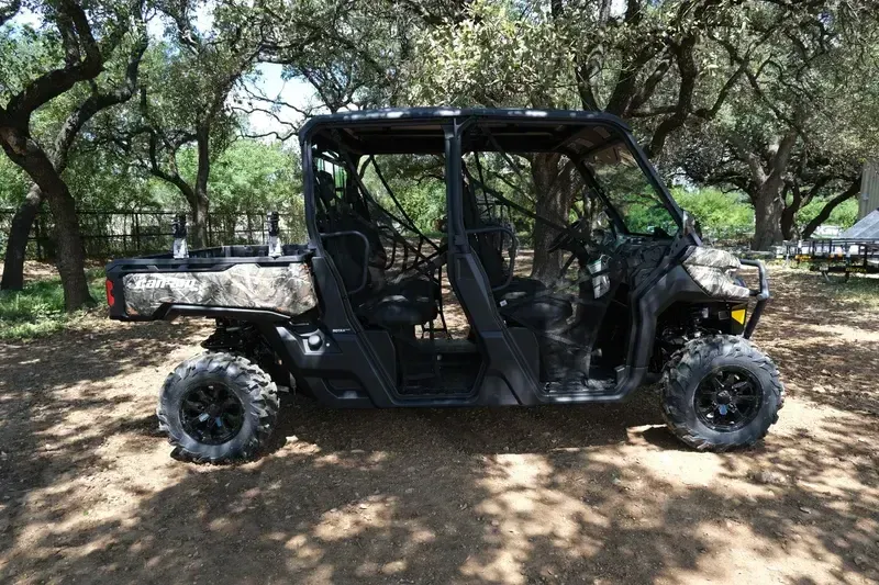 2025 CAN-AM DEFENDER MAX XT HD10 WILDLAND CAMO in a WILDLAND CAMO exterior color. Family PowerSports (877) 886-1997 familypowersports.com 