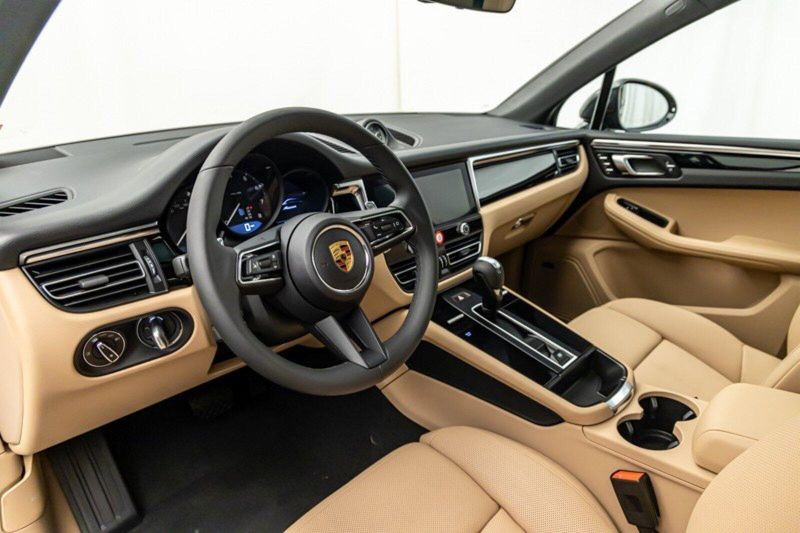 2024 Porsche Macan  in a Black exterior color and Black/Mojave Beigeinterior. Lotus Manhattan 347-395-5714 lotusmanhattan.com 